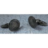 GEORG JENSEN: A pair of gentleman's silver cufflinks of circular form, with solid bar connections