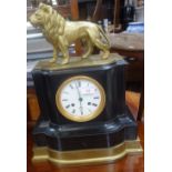 A 19TH CENTURY SLATE CASED MANTEL CLOCK decorated with a gilt spelter lion, 48cm high