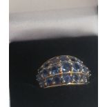 A KYANITE DRESS RING, three rows of kyanites, on a yellow gold shank, stamped "375", ring size N