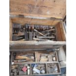 A 19TH CENTURY TOOL CHEST containing a quantity of moulding planes and other tools