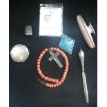 A 'CORAL' BRACELET with attached silver cross and a collection of sundries