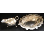 AN EARLY 20TH CENTURY EMBOSSED SILVER BON BON DISH and a sauce boat (2) approx 14.70oz