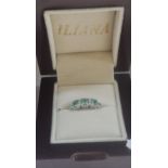 AN EMERALD AND DIAMOND RING, on a 9k white gold shank, ring size N