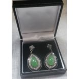 A PAIR OF DROP EARRINGS set with cabochon jade, onyx and diamonds, in a fitted presentation case