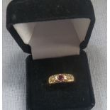 A PEARL AND RUBY GYPSY STYLE RING, on an 18ct yellow gold shank, ring size N