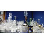 A COLLECTION OF GLASSWARE including decanters