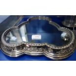 ELKINGTON & CO: A SILVER PLATED MIRROR-PLATEAU, trefoil form, the border decorated in relief with