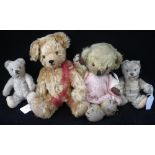 A VINTAGE MERRYTHOUGHT PLUSH TEDDY BEAR, with jointed limbs, 26cm high, two smaller Vintage bears,