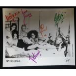 AUTOGRAPHS; THE SPICE GIRLS; A SIGNED BLACK AND WHITE PHOTOGRAPH, Gerri, Mel B, Melanie C,