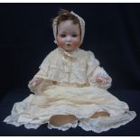 AN EDWARDIAN BISQUE GERMAN DOLL (Bahr & Proschild, not marked) stamped '585 13 Germany' with