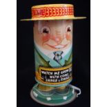 A VINTAGE 1930S TIN-PLATE MONEY BOX in the form of a man with a boater, 'Watch me grow tall' 15cm