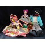 A VINTAGE GOLLY, a similar felt head, an 'Upside down' novelty woolen doll and a similar novelty '