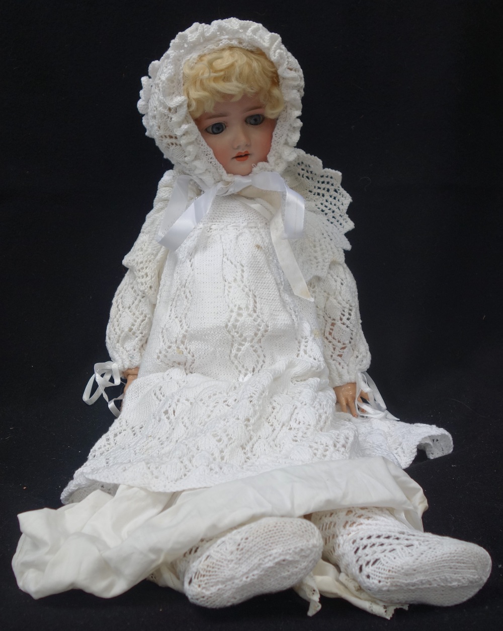 SCHOENAU & HOFFMEISTER; AN EARLY 20TH CENTURY BISQUE HEADED DOLL, stamped 'S.P.B.H 1909 7 1/2