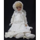 SCHOENAU & HOFFMEISTER; AN EARLY 20TH CENTURY BISQUE HEADED DOLL, stamped 'S.P.B.H 1909 7 1/2