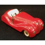 JIBBY; A VINTAGE TINPLATE CLOCKWORK OPEN CAR in red, made in Switzerland