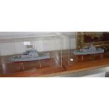 GREYSLAND SYSTEMS LIMITED; A MODEL FAST PATROL BOAT in a perspex case with a teak base and another