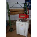 TRI-ANG; A VINTAGE IRON TOY MANGLE with wooden rollers, 50cm high and a Vintage top loading toy '