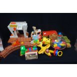 A WEEBLE 'WOBBLE PLANE' a Fisher-Price 'lift and load' railroad and similar Vintage toys