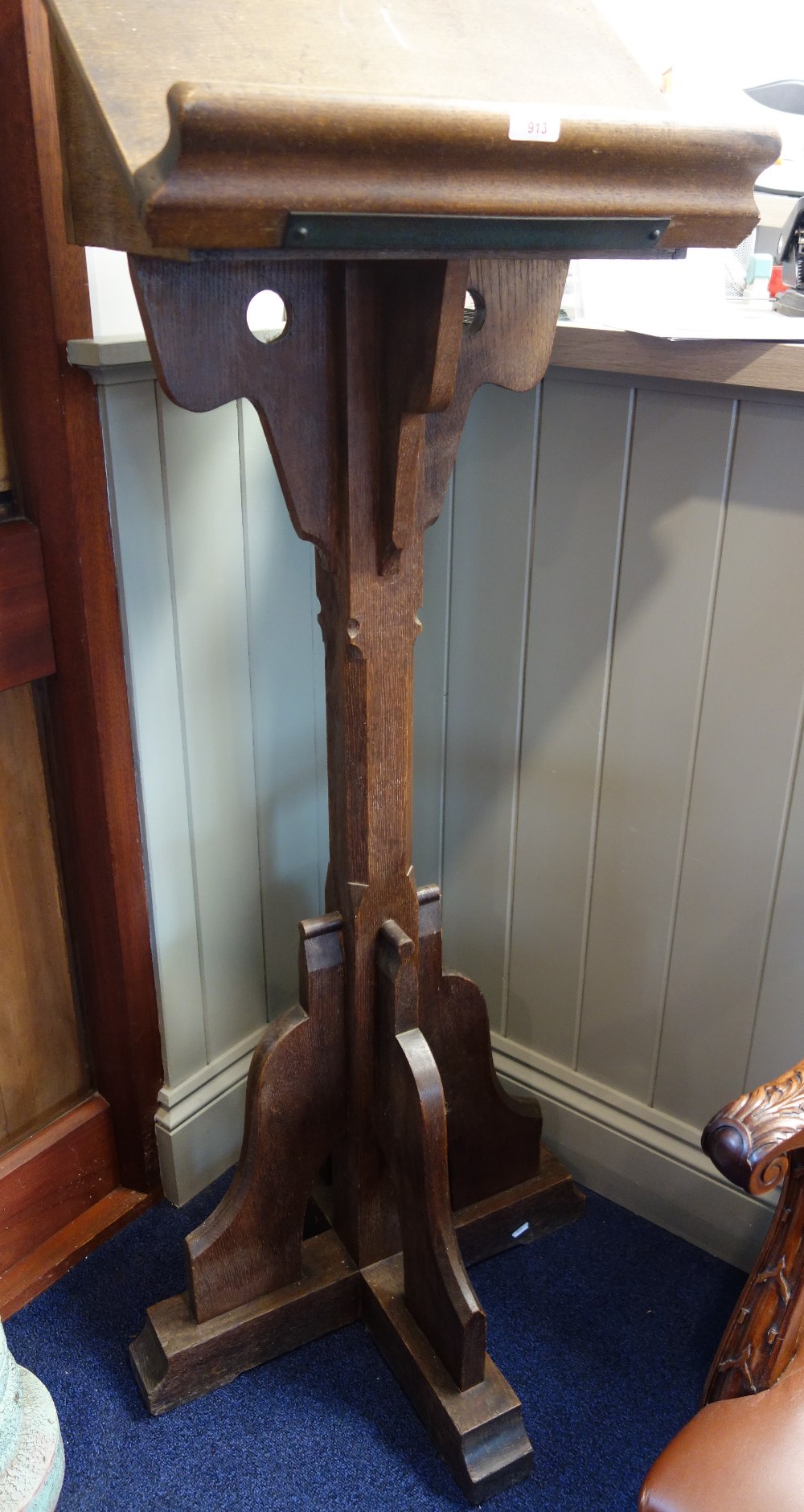 AN EDWARDIAN OAK LECTERN, with brass plaque inscribed 'given by Richard Brewer.... to the parish