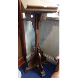 AN EDWARDIAN OAK LECTERN, with brass plaque inscribed 'given by Richard Brewer.... to the parish
