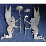 A PAIR OF METAL CUT OUT ANGEL SILHOUETTE WALL SCONCES