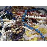 A COLLECTION OF BEADED NECKLACES, to include an Indian style white metal and bead necklace