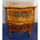 A 19TH CENTURY FRENCH STYLE BOMBE FRONTED CHEST of two drawers, with ormolu mounts and handles,