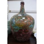 A 19TH CENTURY HAND BLOWN GLASS CARBOY BOTTLE, 53cm high, with later painted decoration