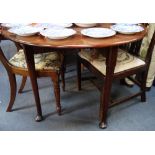 A GEORGE II MAHOGANY PAD FOOT DROP FLAP DINING TABLE