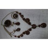 A SUITE OF GARNET JEWELLERY, to include a necklace, brooch and earrings, together with a similar