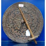 A 19TH CENTURY CHINESE WOODEN LID, with carved decoration, 32cm dia and a decorated bamboo implement