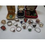 A COLLECTION OF DRESS RINGS, to include a diamond and cabochon "ruby" ring
