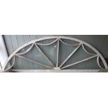 A LARGE ADAM STYLE ARCHITECTURAL FAN LIGHT of arched form, 230 cm wide x 74 cm high