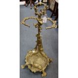 A VICTORIAN STYLE BRASS STICK STAND decorated with sporting motifs