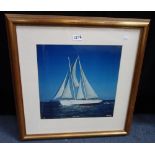 BEKER OF COWES; A FRAMED COLOUR PHOTOGRAPH OF THE SAILING BOAT 'VELEDA'