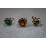 THREE DRESS RINGS, two stamped "585" and one stamped "375", ring sizes K, L, M