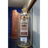 A VINTAGE HILL'S C.A.R. HAIR WASH BOTTLE with glass stopper in a leather case