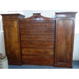 A WILLIAM IV FLAME MAHOGANY GENTLEMAN'S BREAKFRONT WARDROBE, In the Manner of Gillows, the Pagoda