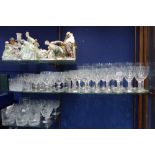 A COLLECTION OF DRINKING GLASSES, including wine glasses