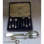 A SET OF SILVER COFFEE SPOONS (BOXED) a large silver serving spoon and two small spoons