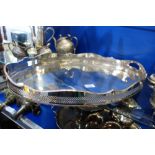 A LARGE SILVER PLATED OVAL TRAY 61cm wide