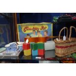 KAY: A vintage chemistry set C. 1960's, a child's guitar, basket wooden blocks, vintage doll's