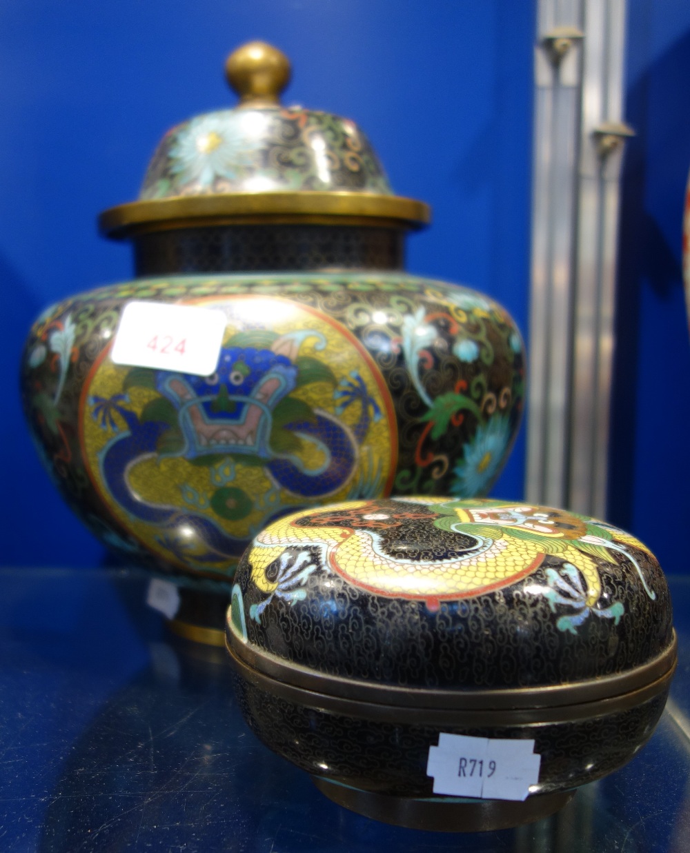 A CLOISONNE LIDDED BOWL DECORATED WITH DRAGONS, 24cm high and a similar lidded bowl (2)