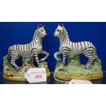 A PAIR OF 19TH CENTURY STAFFORDSHIRE ZEBRA