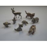 A SMALL COLLECTION OF CAST SILVER AND METALWARE ANIMALS, (8)