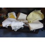 A LARGE COLLECTION OF VINTAGE TABLE LINEN including many placemats, napkins (many monogrammed)