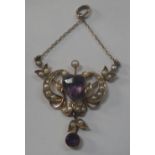 AN EDWARDIAN AMETHYST AND SEED PEARL PENDANT, attached to a short chain