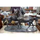 AN AUSTIN SCULPTURE after Le Clerc in bronzed resin of two horses