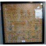 AN EARLY 19TH CENTURY SAMPLER with borders, animals and verse by Ann Bell