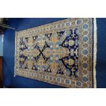 A BLUE GROUND PERSIAN STYLE RUG, 115cm x 187cm (plus fringes)